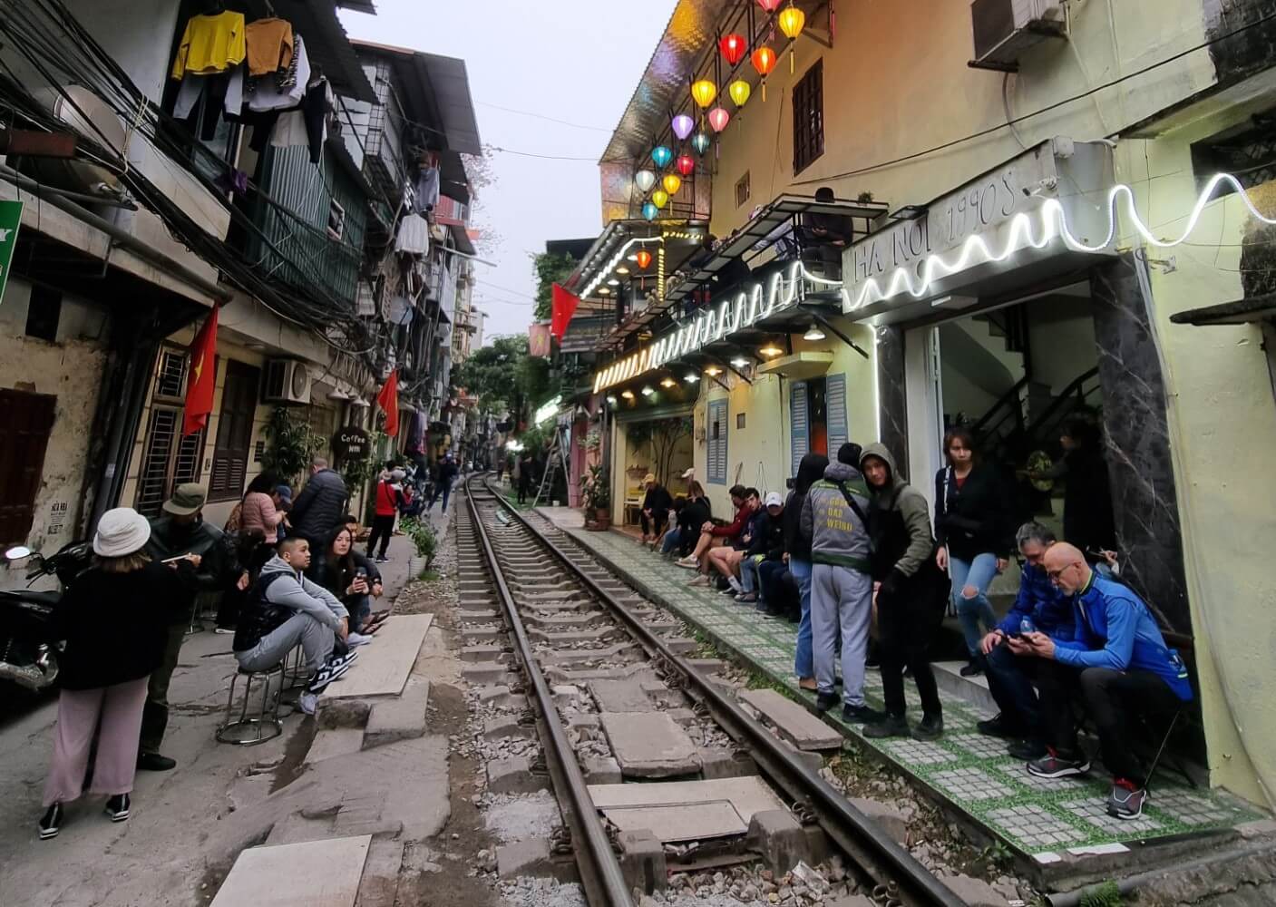 The train street in Hanoi: closed, opened, closed, ope... 2 hanoi 1990s cafe
